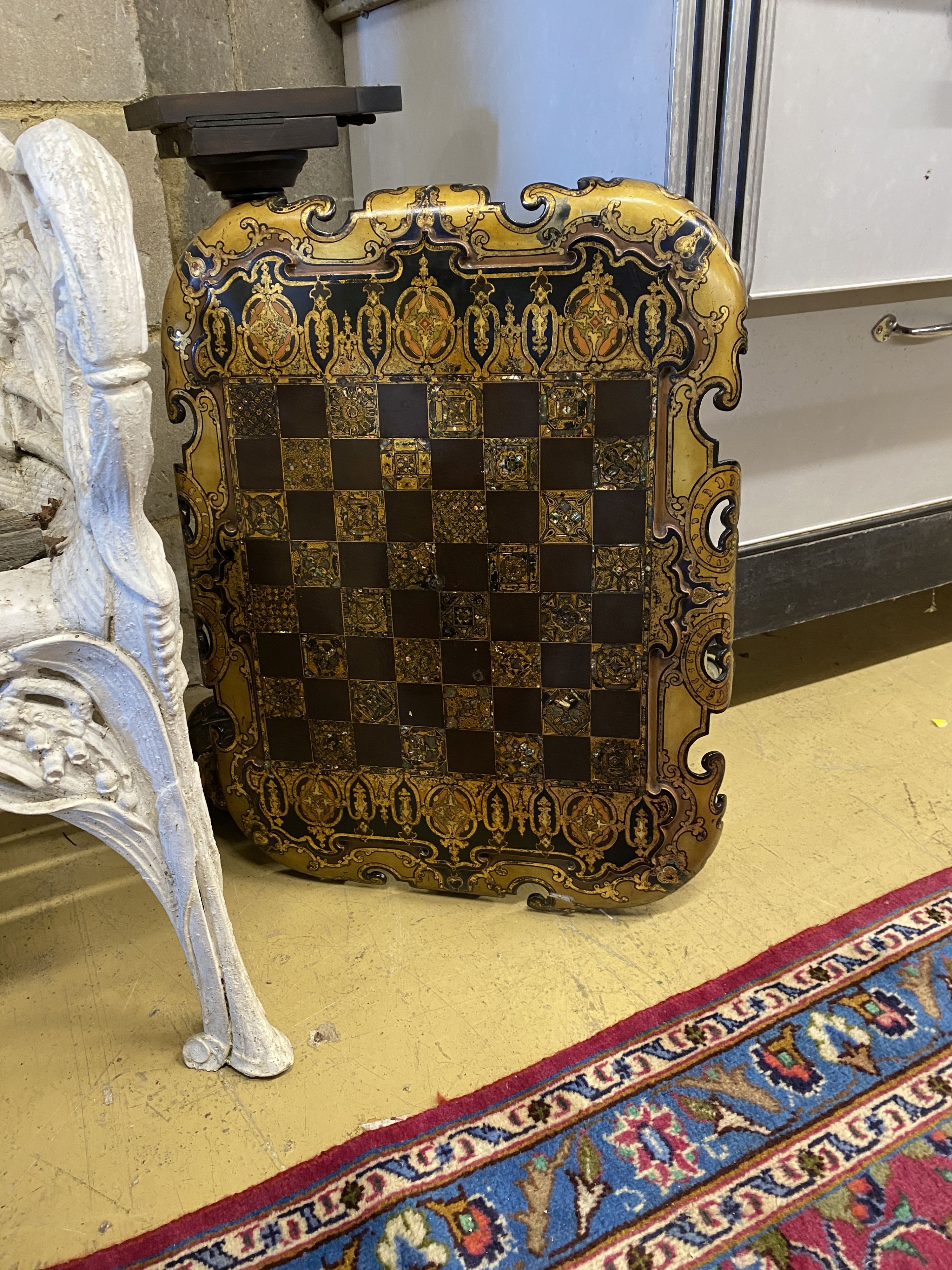 A Victorian Jennens and Bettridge papier mache tilt top games table, width 63cm, depth 50cm, height 70cm